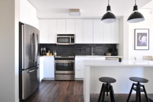 kelowna flooring store kitchen renovation with luxury vinyl plank flooring in dark brown